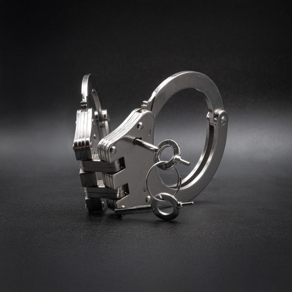 POLICE CUFFS STEEL HINGED